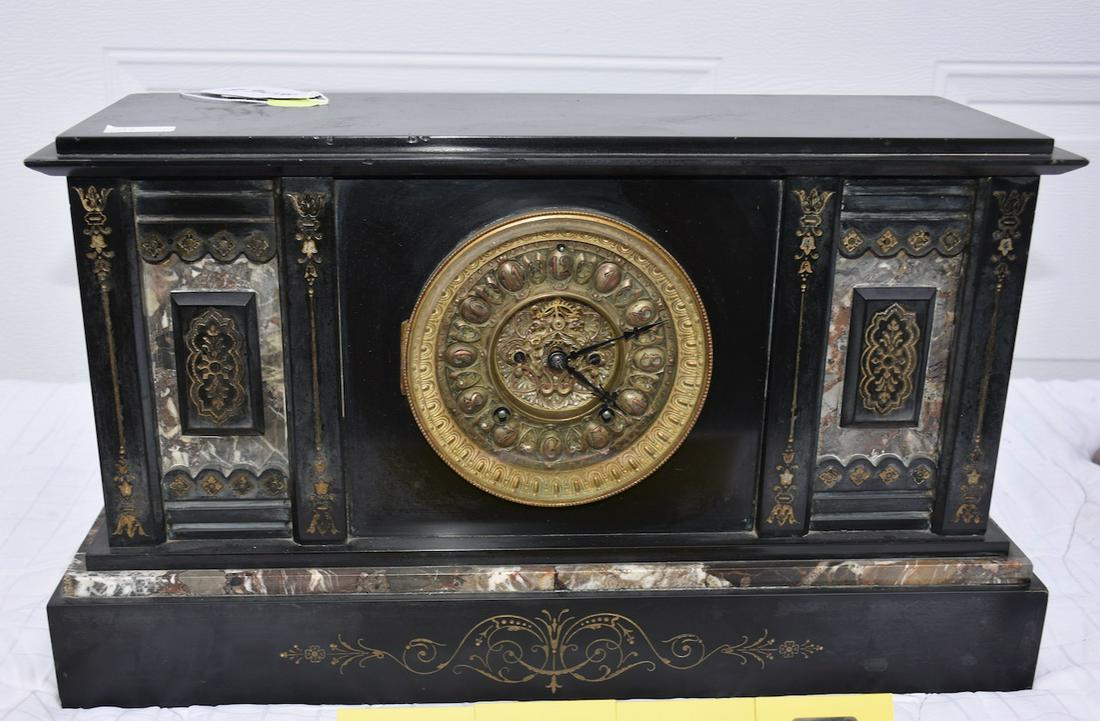 A great marble and granite large mantle clock: Embossed brass clock dial