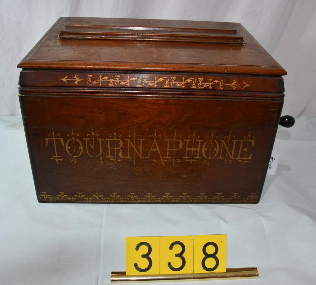 Scarce Tournaphone Table Model Paper Roll Organ: Ca. 1883. One roll included. Original label and stencils. Near Mint and Working condition
