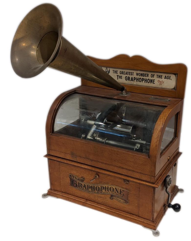 Columbia Model AS coin operated phonograph: Appears complete and a nice example in the oak cabinet with curved glass cabinet, backsplash, reproducer and crank