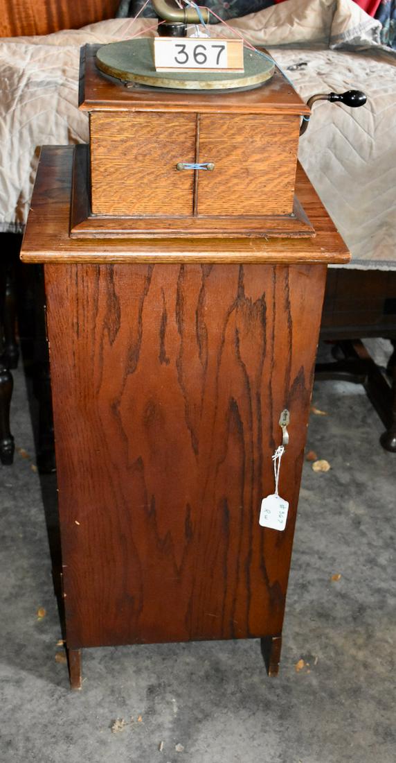 Victor Victrola VV-IV disc machine and cabinet: Exhibition reproducer and oak single door record cabinet with a divided felt lined interior