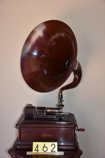 Excellent Edison Opera cylinder phonograph: Type SM, Model A. Mahogany example. Anodized slide-in reproducer. The mandrel and crank are also anodized. Complete with Music Master mahogany cygnet horn and cover. SN-1014