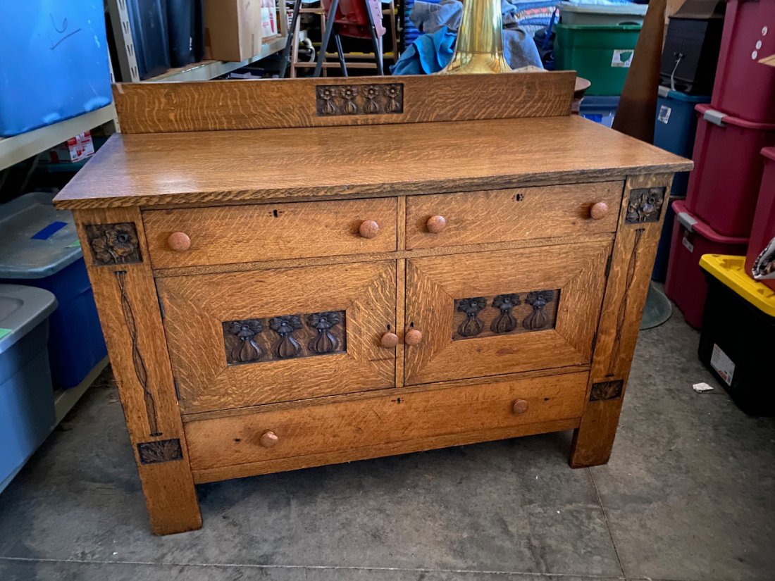 Arts and Crafts Sideboard: The incised carving is an excellent example of this style. Measurements are 52" wide x 22" deep and 42" high to the top of the backboard.