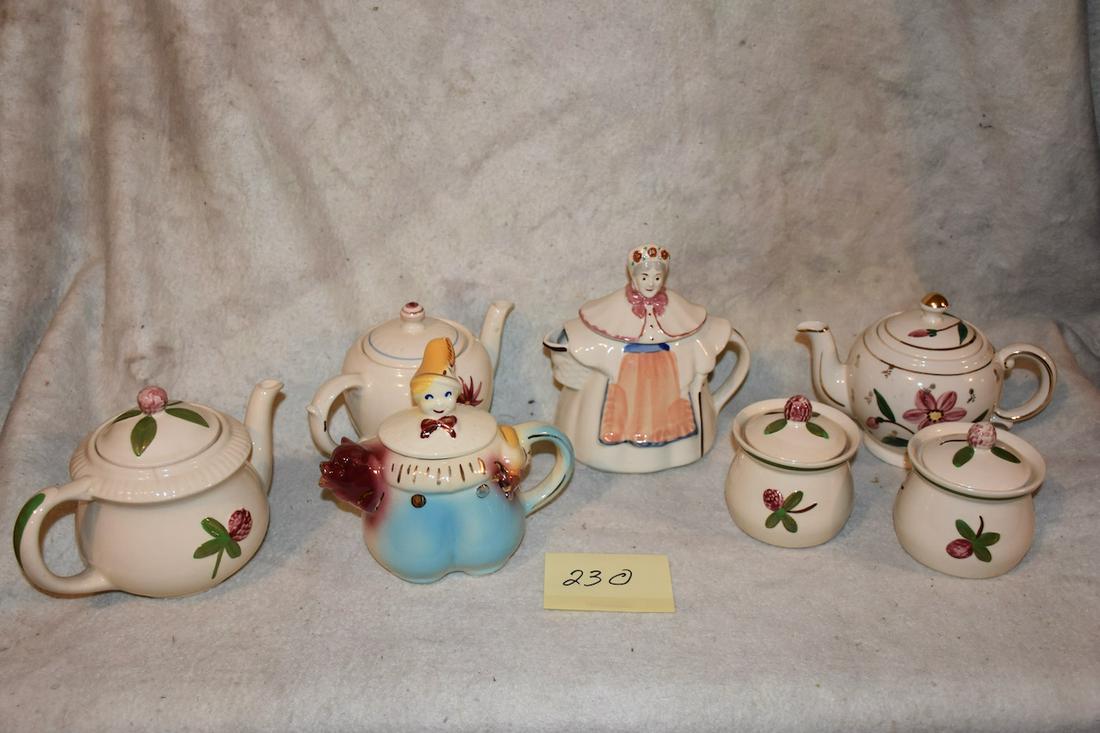 Grou of Shawnee Teapots, etc.: Tom pitcher with gold trim #44, Granny Ann teapot, 3 othertea pots and 2 covered sugars