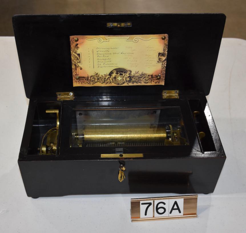 8 Tune Cylinder Music Box: 6" cylinder with tune sheet. Has a Paper tag labeled 1890's Jean Billon Haller". Black lacquer finish. Works fine