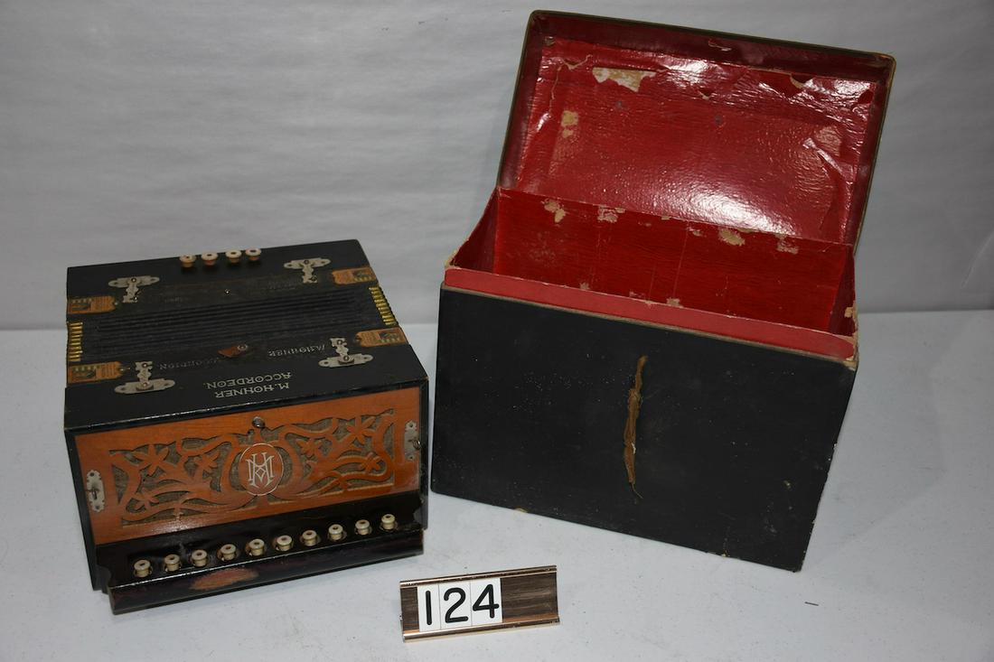 Antique Hohner Squeeze Box or Accordian: Complete with case. 12" x 10" wide x 6" deep. Has original cardboard carrying case with separation to the top