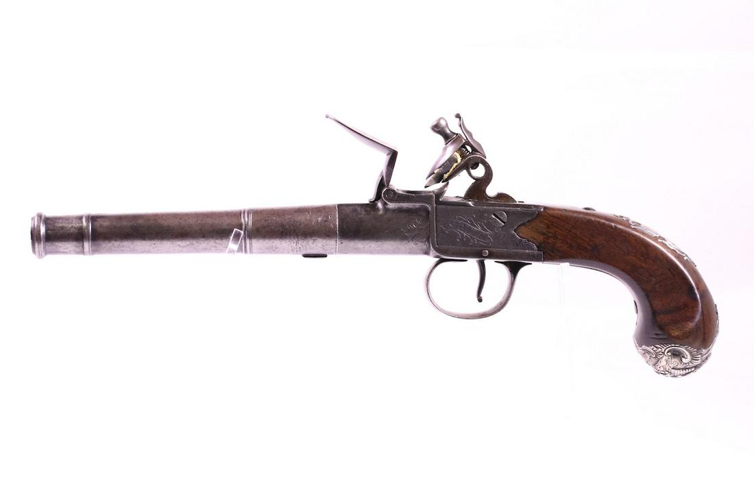 London Cap lock Percussion Pistol: Griffin & Tow, Bond Street, London. Round barrel; Silver design with lion on butt cap; 12-3/4" OAL; Screw barrel; Late 1700's;