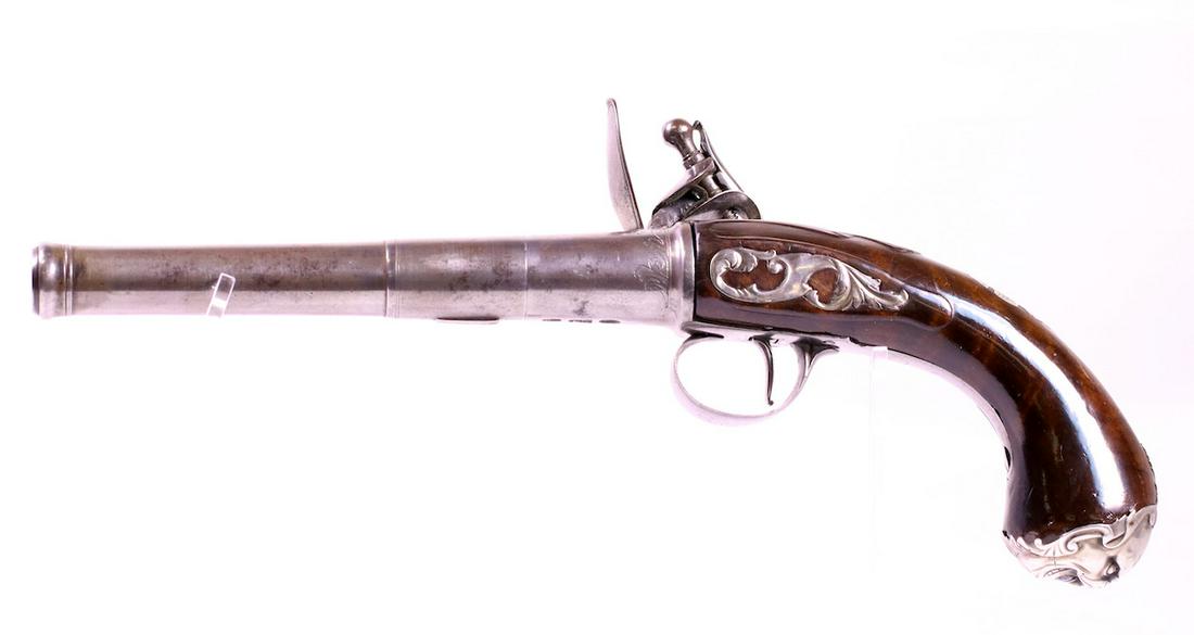 London Flintlock Percussion Pistol: John Harman, London. Proof marks; Screw off barrel; Grotesque Masque ornate butt cap; 5-1/4" barrel; 12-1/4" OAL; Walnut stock;