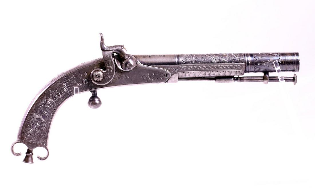 Highland Cap lock Percussion Pistol: Highland Scottish example; All metal; Round metal trigger; Has ramrod; Decorative scrollwork and Unique butt cap; Metal belt clip; Highly decorated; 11" OAL; Silver inlay