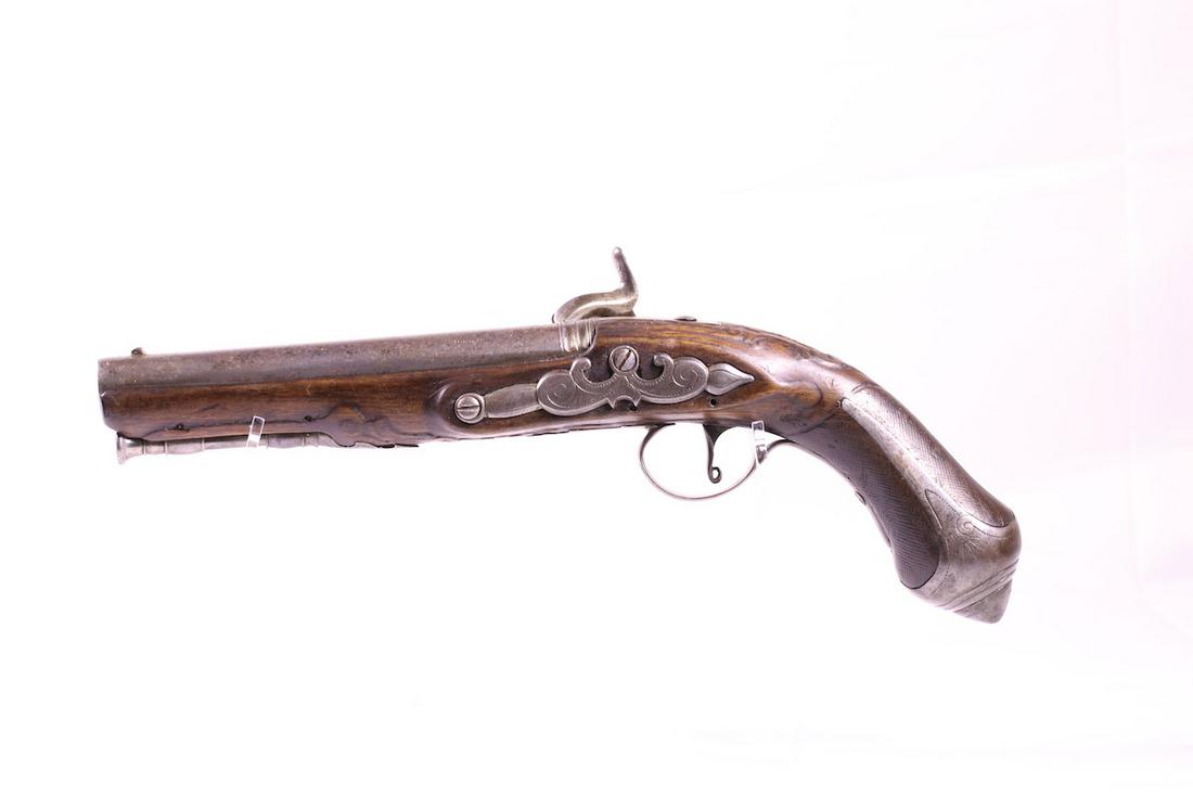 Percussion Cap lock Pistol: Unknown maker; Walnut frame; Ramrod; Scrollwork; 13-1/2" OAL; Metal butt cap;