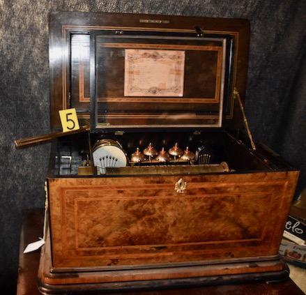 Orchestral Cylinder Music Box: Swiss example, plays 12 tunes with original tune card, 5 saucer bells, drum and castanets. 14" cylinder. One broken tooth. A good box.