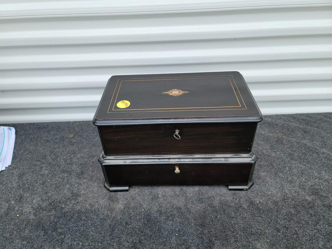B.A. Bremond Interchangeable Music Box: A very good music box with 6 cylinders. 3 tunes per cylinder. Mandolin attachment. 6" cylinders. No broken teeth. Cabinet storage drawers for the cylinders. Inlaid mother of pearl cover
