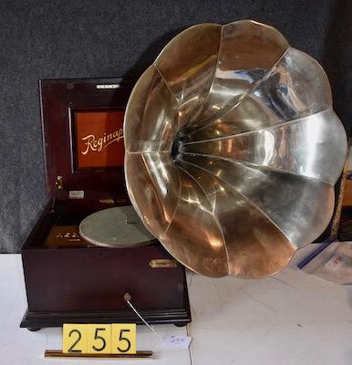 Reginaphone Music Box & Phonograph: The combination machine plays a 12-1/4" disc with 10 discs included. Double comb disc music box with no broken teeth. Complete with all phonograph parts including the turntable, tonearm, crank and rep