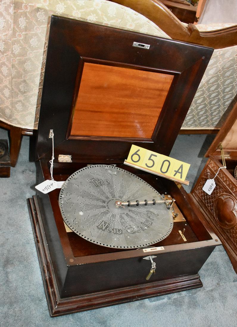 New Century Style 260 Disc Music Box: Plays a 15" disc. Double comb, excellent cabinet. No broken teeth. 17 Discs Included