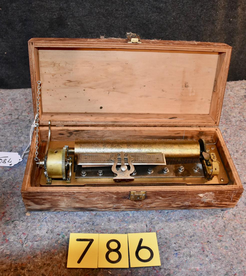Cylinder Music Box Mechanism: Compete with motor, cylinder, comb, ratchet wind and mandolin attachment. No broken teeth