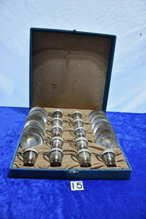 Sterling Tea Set, Cased: 12 cups and saucers with Lenox china inserts. A very nice set. 888 grams. Pattern number S9122