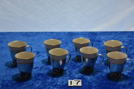 8 Sterling tea cups with inserts: White porcelain inserts. 536 grams. Lapaglia Design. Pattern 118. International Sterling. A nice set