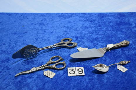 Sterling Grouping: Victorian sterling grape shears, Victorian Cake Serviers, Reed and Barton Jelly spoon and a a sterling handle server. Total weight of the pieces is 258 grams