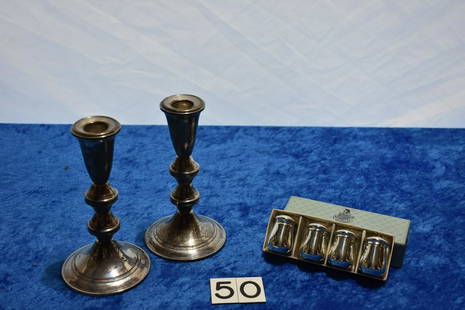 Sterling Weighted Candleholders & Shakers: 4 bottles sterling shakers, Duchin Creation weight candleholders and Wolfenden Sterling boxed shakers, the shakers weigh 24 grams