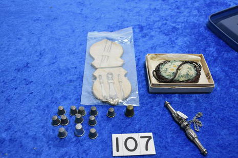 Sewing Items: Sewing kit, sterling needle case, 13 metal child's thimbles, and a basket shaped pin cushion