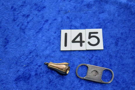 2 Cigar tip cutters: Gold filled and sterling guillotine example