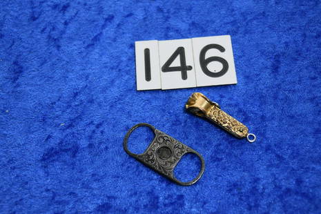 2 Cigar tip cutters: Gold filled and sterling guillotine example