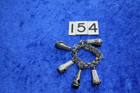 Sterling Bracelet & Tip Cutters: There are five sterling tip cutters on the bracelet including a fish with red eyes