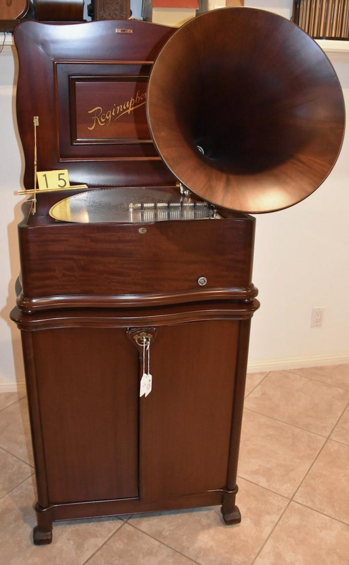 Fantastic Reginaphone 20-3/4" Music Box: An exceptional example originally from the Nick Monios Estate collection this mahogany 20-3/4" disc music box has a short bedplate, double comb, no broken teeth, mahogany smooth wooden horn, as well a