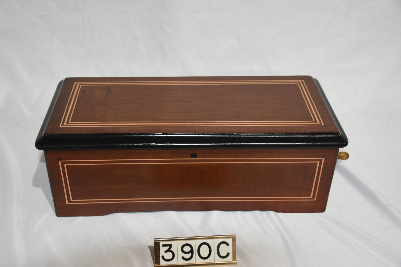 Smaller 6-3/4" Cylinder Music Box: 12 tunes with tune indicator. Case and mechanism was restored