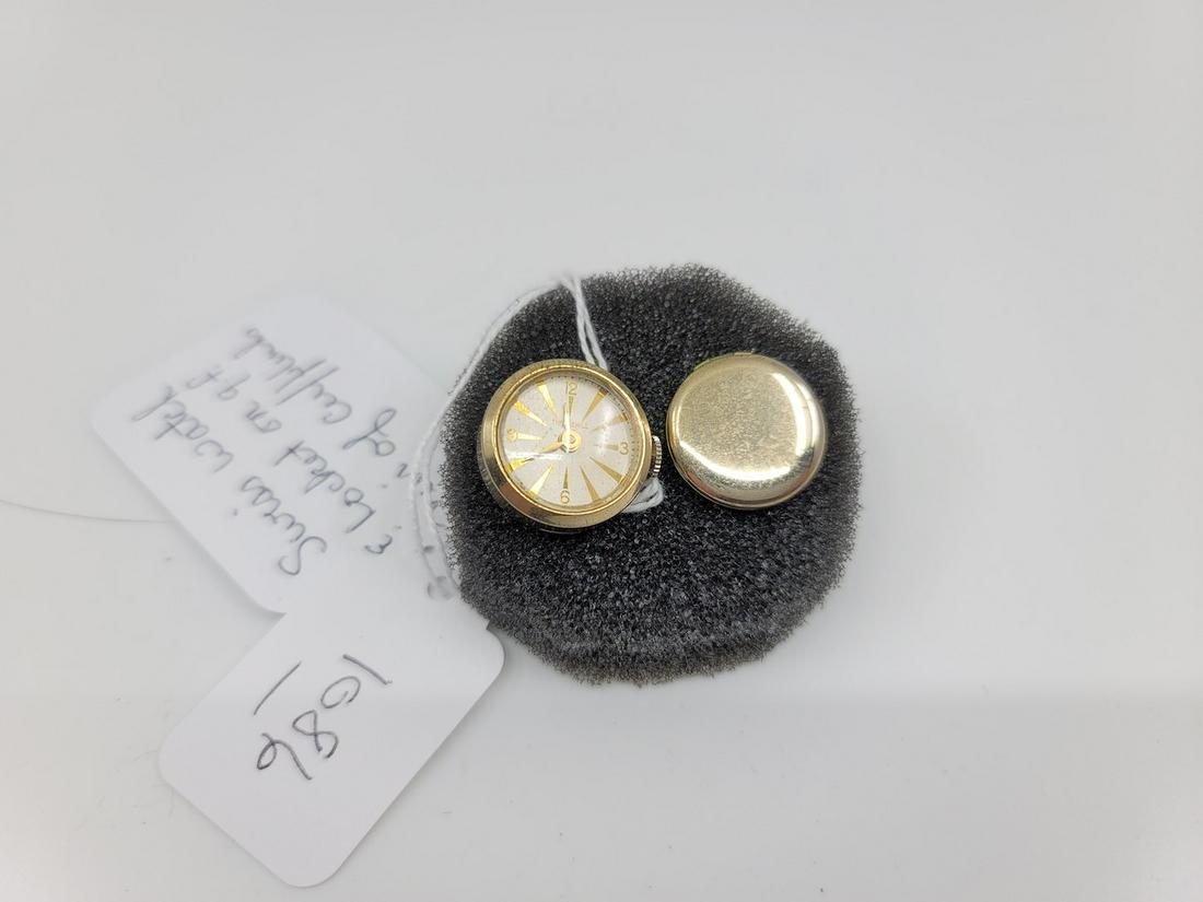 Swiss Watch and Locket on Cufflinks: Gold filled cufflinks.