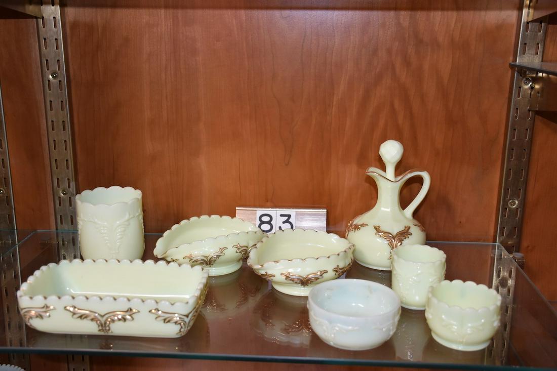 Custard Winged Scroll Table Set: Custard Glass â€“ Winged Scroll pattern including Cruet, 2 olive dishes, pickle dish, undecorated spooner, toothpick, and a toothpick
