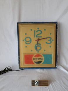 Lighted Pepsi Clock: Price Brothers Corp., Chicago, IL. Measures 16" tall x 13-1/2" wide.