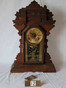 Shelf Clock: Unknown maker. With mercury pendulum. Stands 24" x 16" wide.