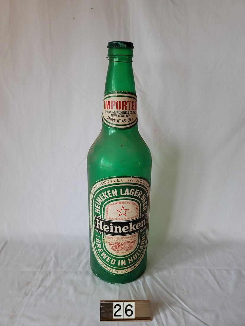 Heineken Advertising Bottle: Plastic with paper label. 24" tall.