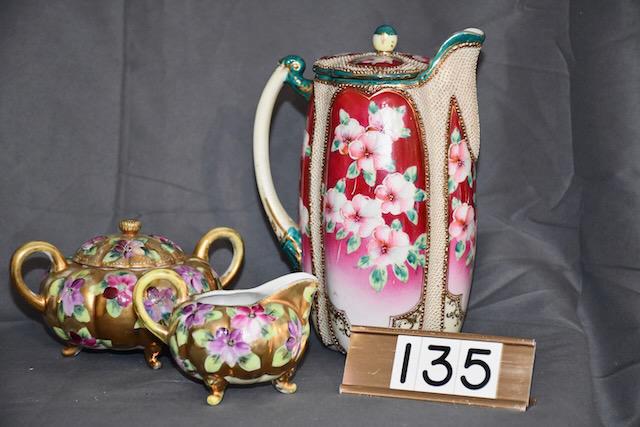 3 Pieces of Decorated China: Attributed to Nippon, including Chocolate pot, and cream and sugar