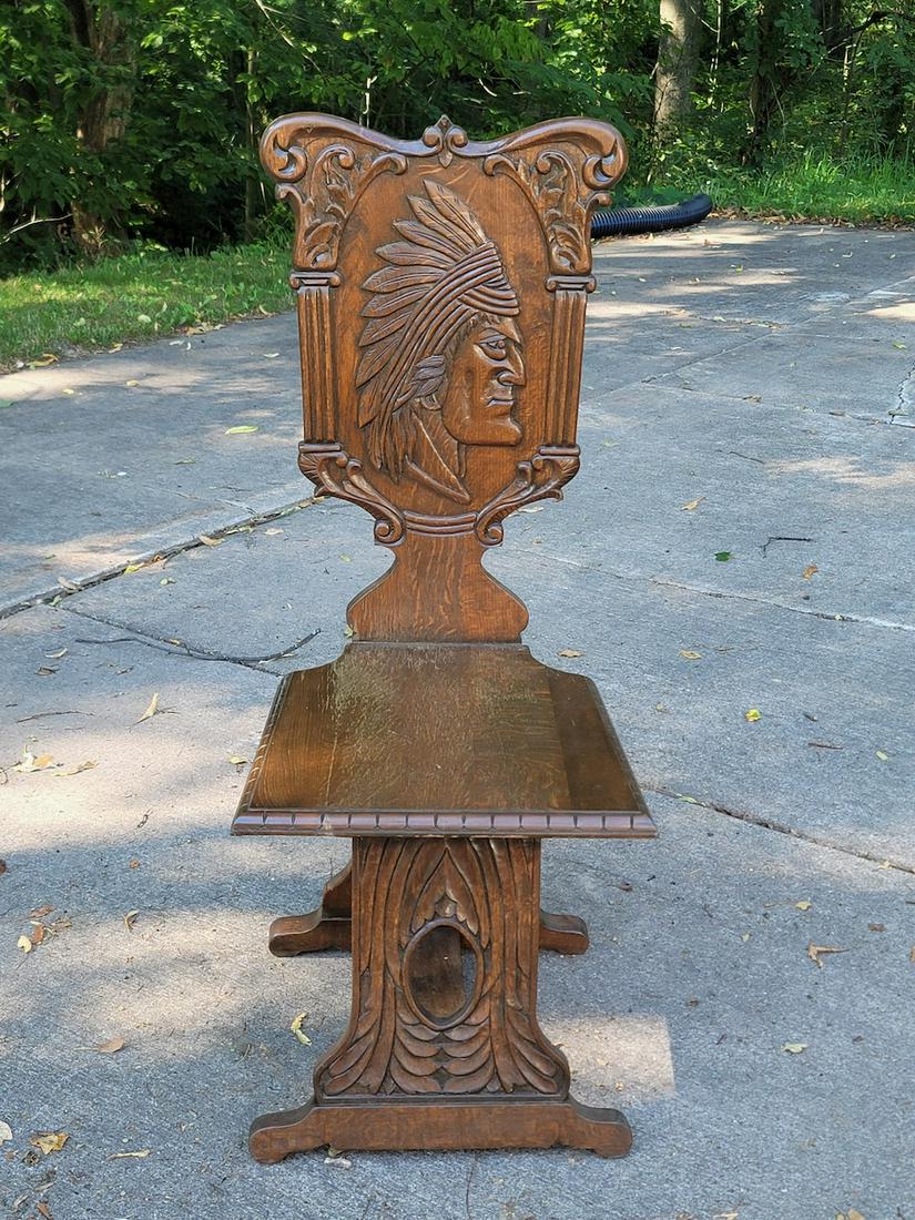 Heavily Carved Oak Chair with Indian Face Carved on Back. (1 of 5)