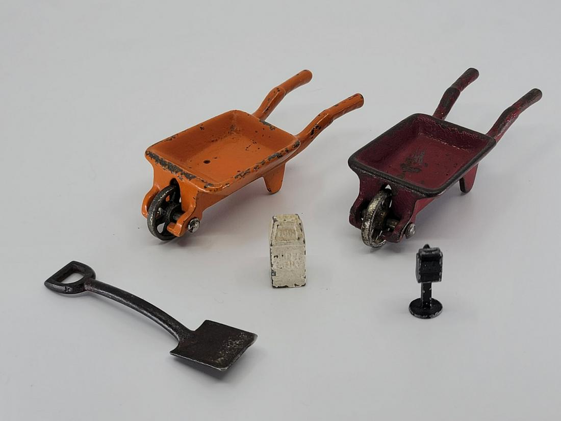 (2) Kilgore Cast Iron Wheelbarrows. Cast Iron Mailbox , Shovel, and Trashcan: Original, Wheelbarrows are 3-3/4" L