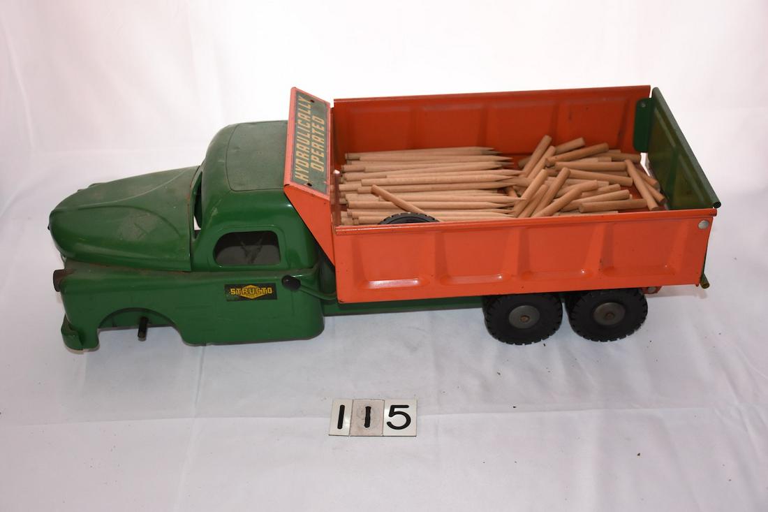 Structo Dump Truck Toy: 20.5 long x 7" tall. The loose wheel is present