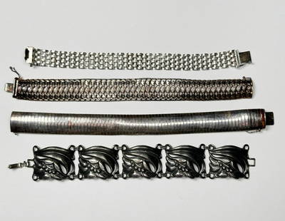 4 Sterling Silver Link Bracelets: All marked sterling or .925. Longest measures 8". Total weight. 98.9 grams.