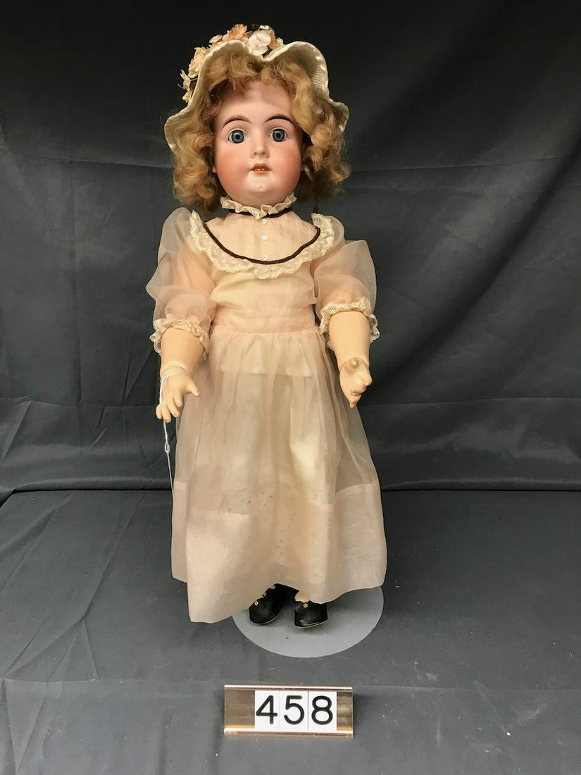 Bisque Head Doll: Socket head, composition body, open mouth, blue eyes, blonde wig, 22" tall. Marked No. 30. Marked with (Backwards C) - C/3