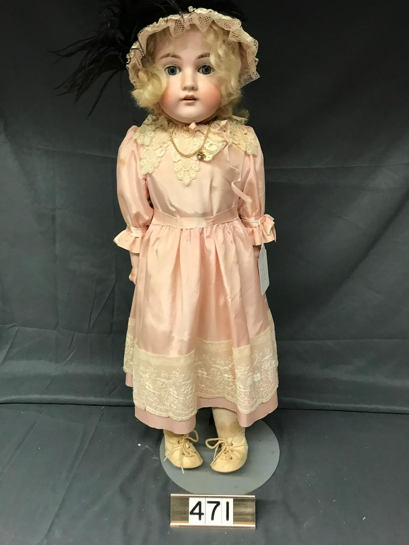 Bisque Head Doll: Marked 12.154 DEP. Open mouth with teeth, sleep eyes.