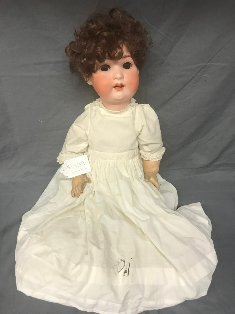 Heubach Kopplesdorf Bisque Doll: 26" tall. Sleep eyes, open mouth with teeth. Jointed. Composition body.