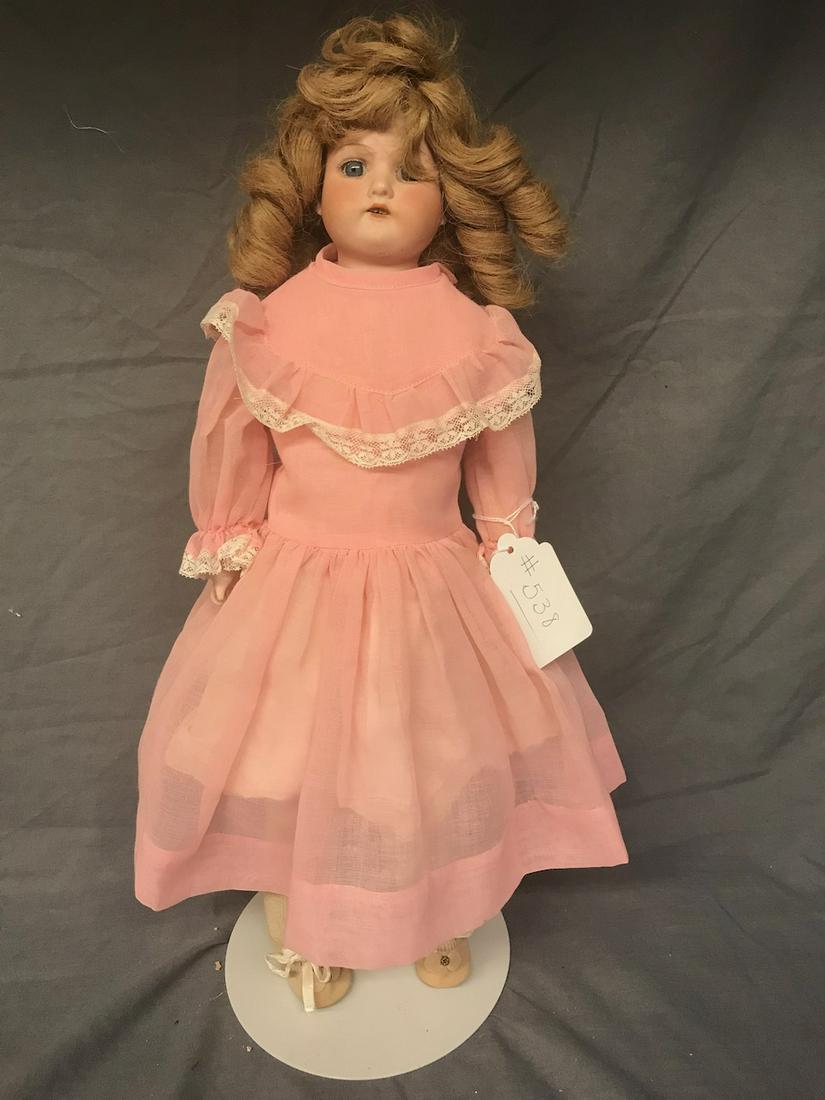 Armand Marseille Bisque Head Doll: Shoulder head, stationary eyes, open mouth with teeth. Marked 370. 19" tall. Leather body