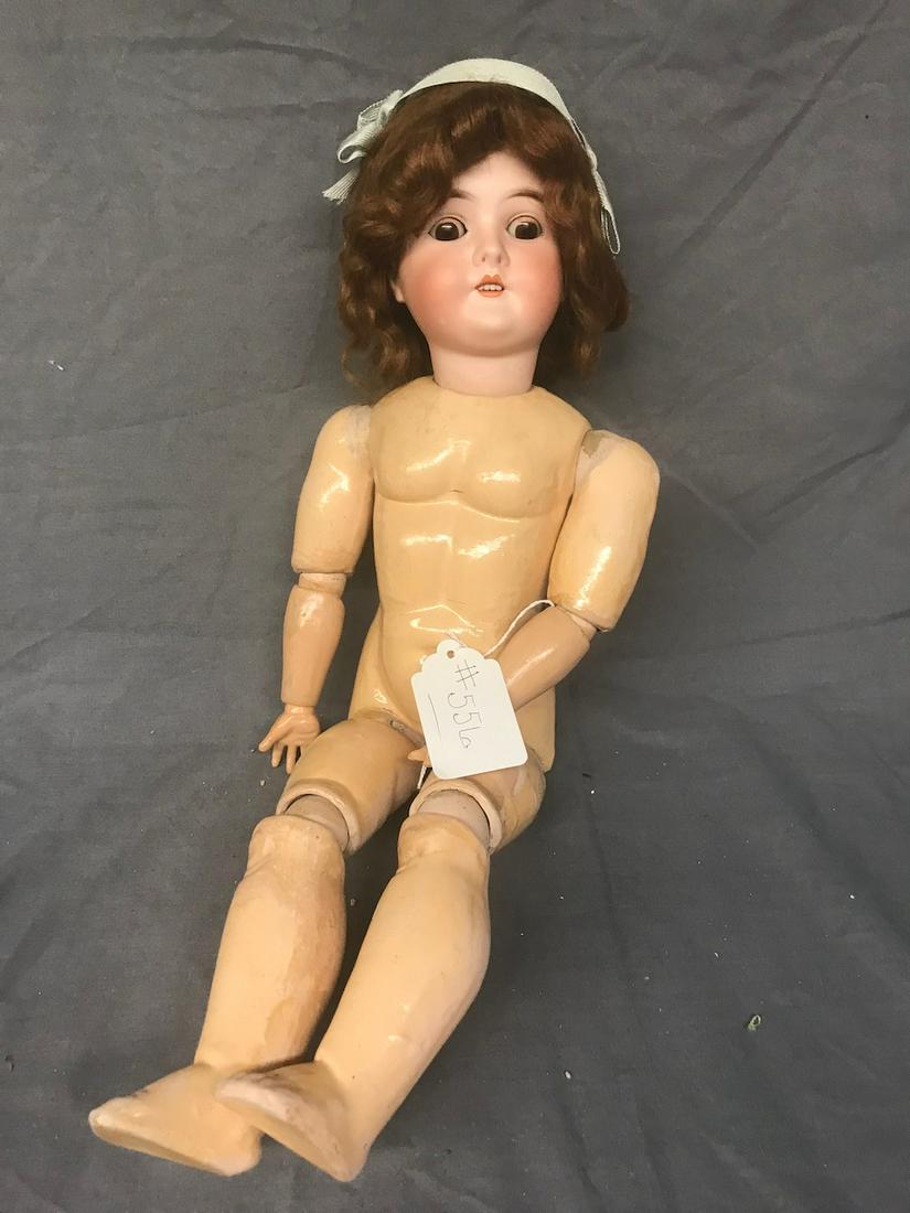 Queen Louise Bisque head doll: 23" tall. Marked Queen Louise Germany. Sleepy eyes, open mouth with teeth.