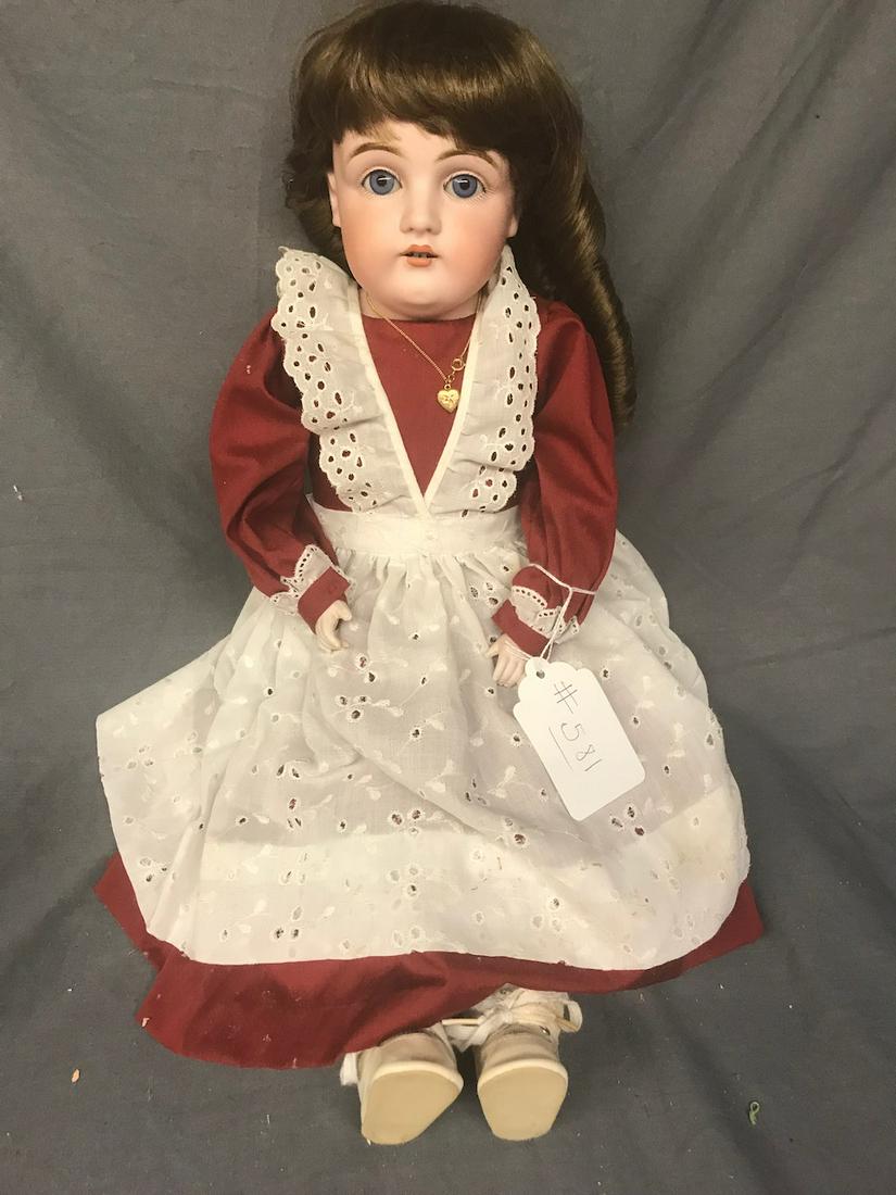 Bisque Head Doll: DEP 10/154. Sleep eyes, open mouth with teeth.