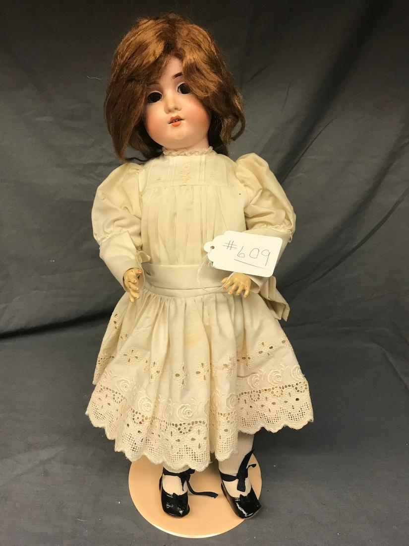 Schoenau & Hoffmeister Bisque Head Doll: Maked Viola Made in Germany. 24" long. H & Co. Composition body, sleep eyes, open mouth with teeth.