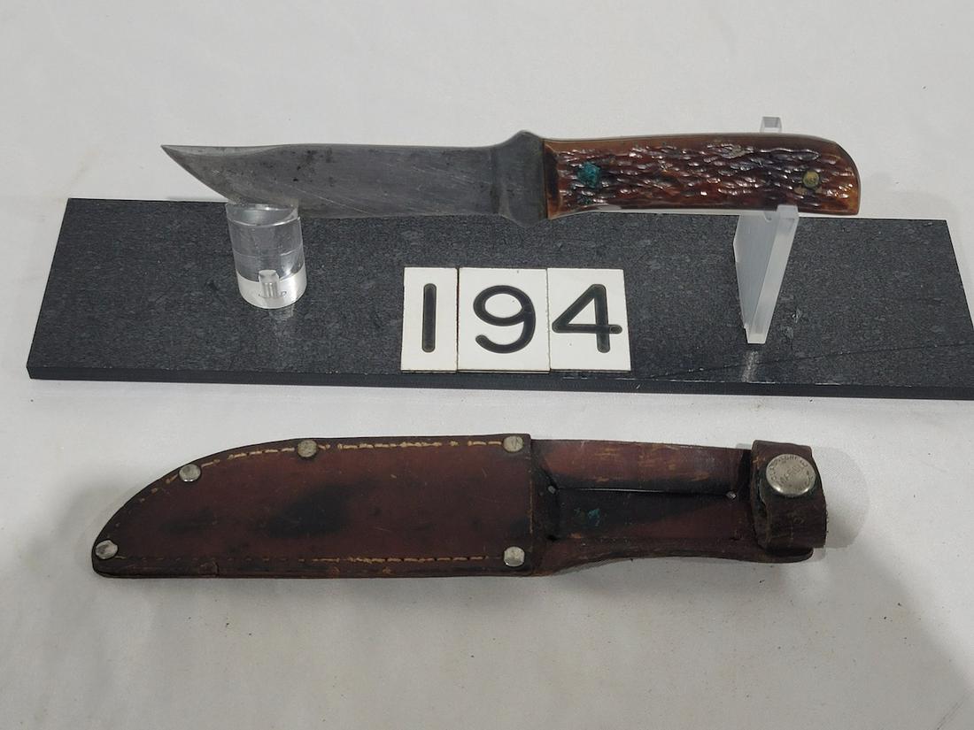 Marbles Outer Knife: Stag handle, 4" blade, 7-1/2" total length. Comes with sheath