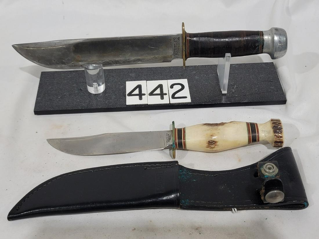 Marbles Ideal and Marbles Expert Knives: Ideal 11" long with a 7" blade, leather wrapped handle, aluminum pommel. Expert measures 9-1/4" long with a 5" blade, stag handle. One sheath