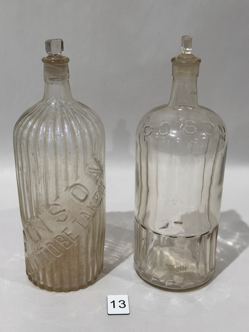 2- Large Clear Embossed Poison Bottles (1 of 2)