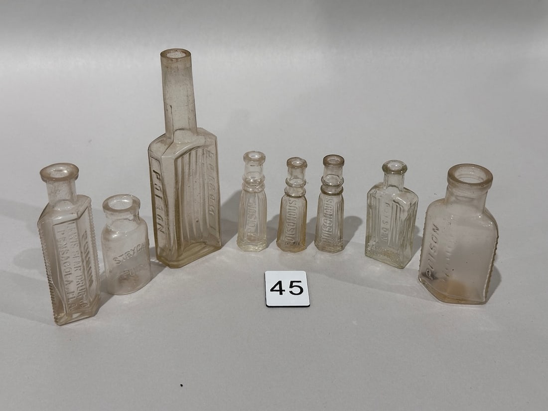 8 ClearPosion Bottle: All marked Poison or Poisonous, 1- has hole in bottom(see Pic). Largest 6"