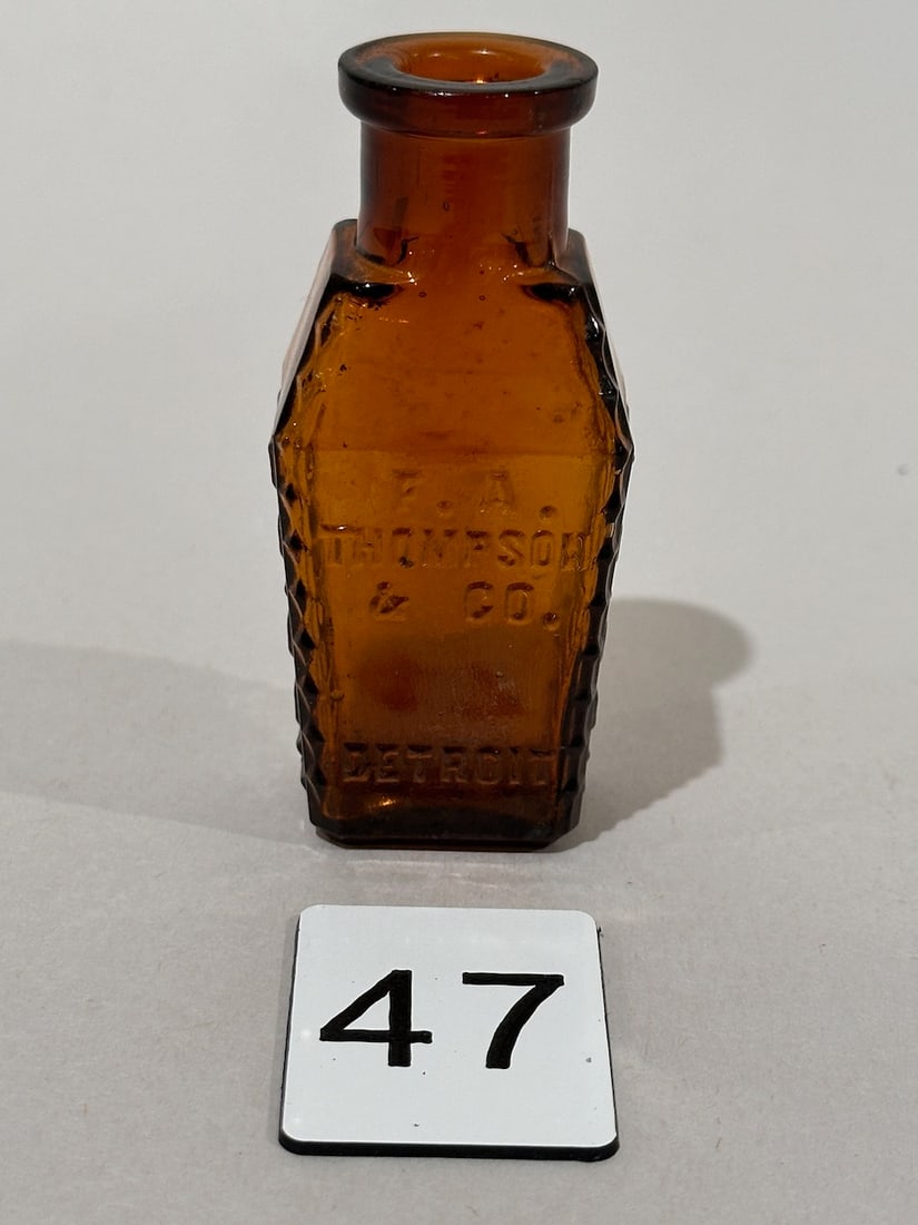 F.A. Thompson & Co., Detroit Amber Poison Bottle (1 of 3)